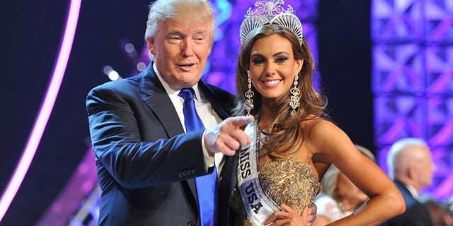 Donald Trump and Miss Connecticut USA Erin Brady after she won the 2013 Miss USA pageant in Las Vegas.