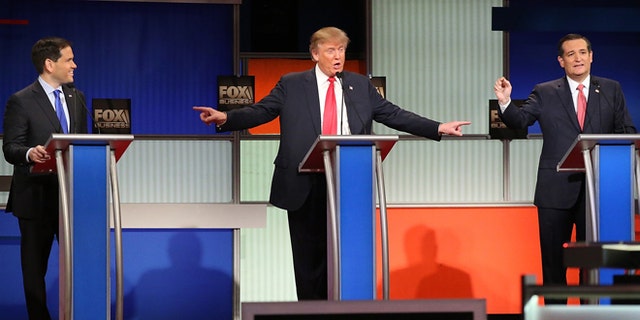 NORTH CHARLESTON, SC - JANUARY 14:  Republican presidential candidates (L-R) Sen. Marco Rubio (R-FL), Donald Trump and Sen. Ted Cruz (R-TX) participate in the Fox Business Network Republican presidential debate at the North Charleston Coliseum and Performing Arts Center on January 14, 2016 in North Charleston, South Carolina. The sixth Republican debate is held in two parts, one main debate for the top seven candidates, and another for three other candidates lower in the current polls.  (Photo by Scott Olson/Getty Images)