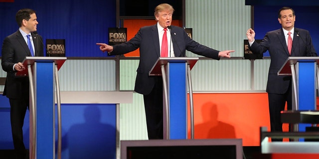 NORTH CHARLESTON, SC - JANUARY 14: Republican presidential candidates (L-R) Sen. Marco Rubio (R-FL), Donald Trump and Sen. Ted Cruz (R-TX) participate in the Fox Business Network Republican presidential debate at the North Charleston Coliseum and Performing Arts Center on January 14, 2016 in North Charleston, South Carolina. The sixth Republican debate is held in two parts, one main debate for the top seven candidates, and another for three other candidates lower in the current polls. (Photo by Scott Olson/Getty Images)