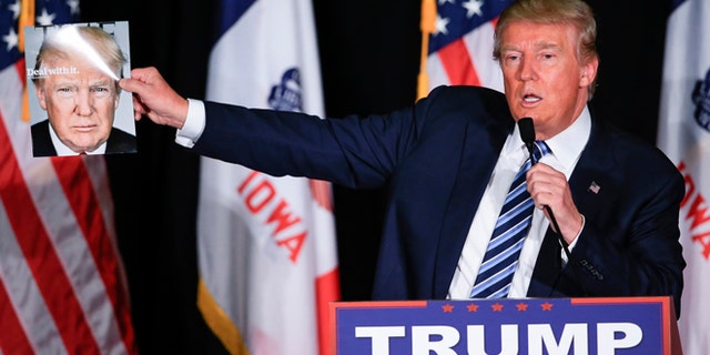 Donald Trump speaks during a campaign stop in Council Bluffs, Iowa, Tuesday, Dec. 29, 2015.