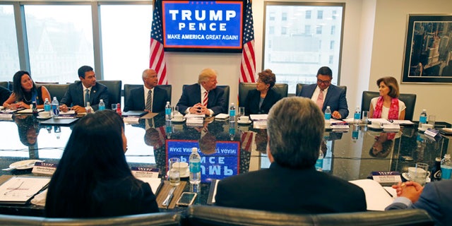 Republican presidential candidate Donald Trump holds a Hispanic advisory roundtable meeting in New York, Saturday, Aug. 20, 2016. (AP Photo/Gerald Herbert)