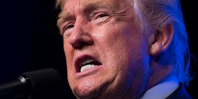 Republican presidential candidate Donald Trump speaks during a campaign rally at the James L. Knight Center, Friday, Sept. 16, 2016, in Miami. (AP Photo/ Evan Vucci)