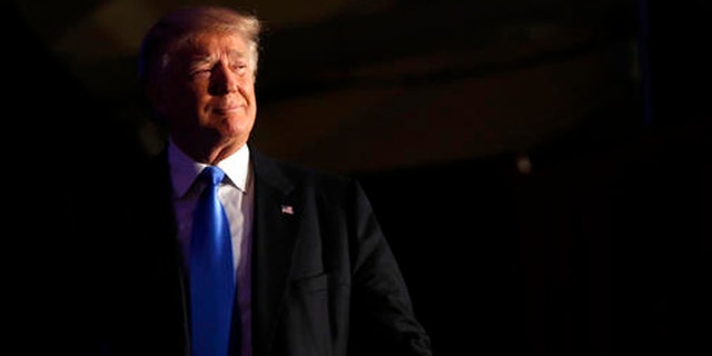 Republican presidential candidate Donald Trump arrives to speak at a campaign rally in Manchester, N.H., Thursday, Aug. 25, 2016. (AP Photo/Gerald Herbert)