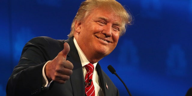 BOULDER, CO - OCTOBER 28: Presidential candidate Donald Trump gives a thumbs up during the CNBC Republican Presidential Debate at University of Colorados Coors Events Center October 28, 2015 in Boulder, Colorado. Fourteen Republican presidential candidates are participating in the third set of Republican presidential debates. (Photo by Justin Sullivan/Getty Images)