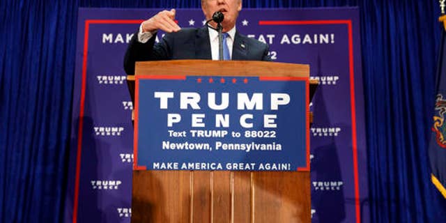 Republican presidential candidate Donald Trump speaks during a campaign rally, Friday, Oct. 21, 2016, in Newtown, Pa. (AP Photo/ Evan Vucci)
