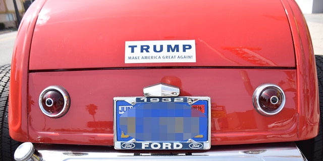 A Massachusetts woman was reportedly taken into custody on Monday after she allegedly drove into a car sporting a Trump bumper sticker.