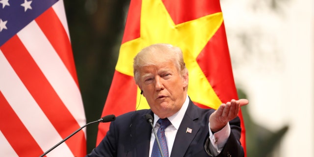 President Donald Trump speaks during a news conference at the Presidential Palace in Hanoi, Vietnam, Nov. 12, 2017.