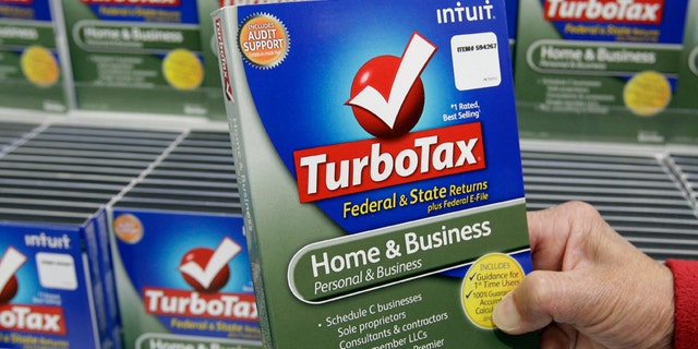 In this Jan. 24, 2013, photo, a customer looks at a copy of TurboTax on sale at Costco in Mountain View, California.