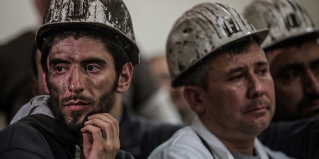 May 16, 2014 - Turkish miners listen to the mining company's owner, Alp Gurkan, during a news conference in Soma, Turkey. The Turkish mining company defended its safety record, 4 days after more than 284 people died in an underground blaze at its coal mine in western Turkey.