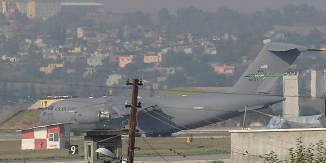 A United States Air Force cargo plane maneuvers on the runway after it landed at the Incirlik Air Base, in Adana, southern Turkey, Sunday, Aug. 9, 2015. The U.S. European Command said in a statement Sunday that the U.S. Air Force deployed a “small detachment” of six F-16 fighter jets, support equipment and about 300 personnel at Incirlik Air Base. Turkey last month carried out airstrikes against Islamic State targets and had agreed to allow the U.S. to use the strategically located base in the coalition against the Islamic State group in Syria. (AP Photo)