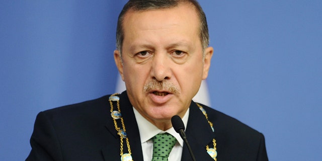 Oct. 11: Turkey's Prime Minister Recep Tayyip Erdogan speaks during a news conference in Ankara.