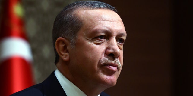 Dec. 12, 2014: Turkey's President Recep Tayyip Erdogan addresses a meeting with business leaders in Ankara, Turkey.