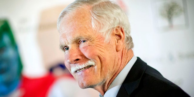 FILE - In this Friday, Dec. 6, 2013 file photo, American media mogul Ted Turner is photographed on the red carpet at the Captain Planet Foundation benefit gala in Atlanta. Turner Enterprises spokesman Phillip Evans in Atlanta said the CNN founder was hospitalized in South America and that "no further details will be provided." CNN's news desk, tweeted that Turner was "under observation" Friday, March 7, 2014, at a hospital in Buenos Aires. (AP Photo/David Goldman, File)