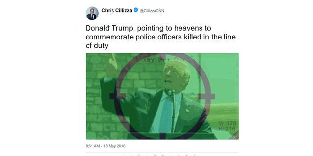 The commentator, Chris Cillizza, tweeted out a GIF with the visual just before 9 a.m., along with the caption “Donald Trump, pointing to heavens to commemorate police officers killed in the line of duty.”