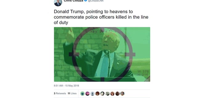 The commentator, Chris Cillizza, tweeted out a GIF with the visual just before 9 a.m., along with the caption “Donald Trump, pointing to heavens to commemorate police officers killed in the line of duty.”