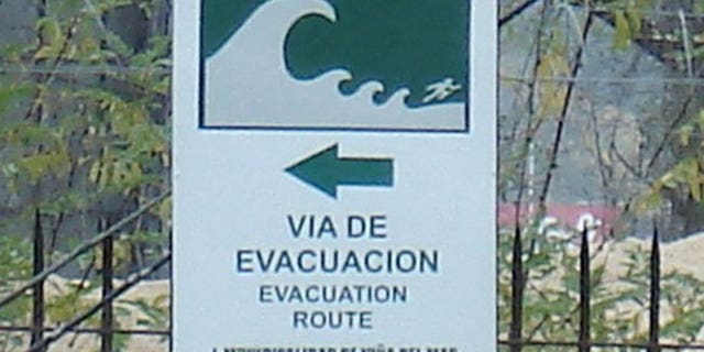 An evacuation sign in Chile. #paulogustavo tweets that Chile is prepared for catastrophe after multiple earthquake struck Viña del Mar in 1983.