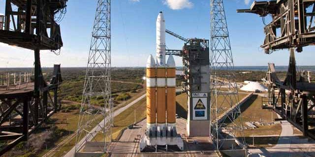 A United Launch Alliance Delta IV Heavy sits poised on its launch pad with a National Reconnaissance Office payload at Space Launch Complex-37. The Delta IV Heavy with its nearly 2 millions pounds of thrust is America’s most powerful liquid-fueled rocket.