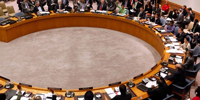 Member states vote to approve a resolution that will impose a no-fly zone over Libya during a meeting of the United Nations Security Council at UN headquarters Thursday, March 17, 2011. (AP)