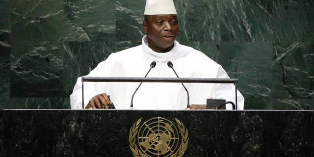FILE - In this Thursday, Sept. 25, 2014, file photo, Gambia's President Al Hadji Yahya Jammeh addresses the 69th session of the United Nations General Assembly at the United Nations headquarters. Gambia accused European countries of "racist and inhuman behavior" for deliberately causing boats carrying black African migrants to sink. (AP Photo/Frank Franklin II, File)