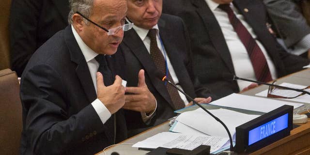 French Foreign Minister Laurent Fabius speaks during a high level meeting on Libya Thursday, Sept. 25, 2014, during the 69th session of the U.N. General Assembly meetings at the United Nations headquarters. (AP Photo/Bebeto Matthews)