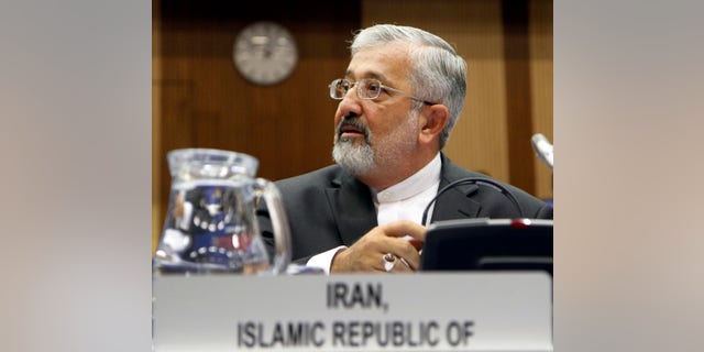 Iran's Ambassador to the International Atomic Energy Agency, IAEA, Ali Asghar Soltanieh waits for the start of the IAEA board of governors meeting at the International Center, in Vienna, Austria, on Wednesday, Sept. 14, 2011.