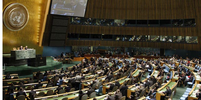 Feb. 16, 2012: In this photo provided by the United Nations, Syrian Ambassador to the United Nations Bashar Ja'afari can be seen on the monitor as he addresses the U. N. General Assembly.