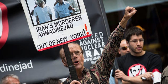 Sept. 24, 2012: Osborn Holmstrand of Sweden, chants during an anti-Mahmoud Ahmadinejad protest near the Warwick hotel in New York.