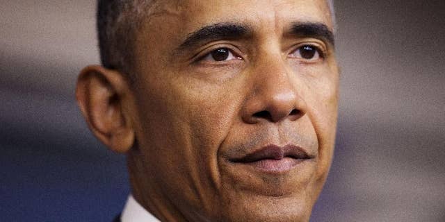 FILE - In this April 23, 2015 file photo, President Barack Obama pauses while speaking in the Brady Press Briefing Room of the White House in Washington, where he took full responsibility for deaths of American, Italian hostages, expresses apologies. The accidental killing of two hostages in a U.S. counterterrorism operation against al-Qaida has raised pressure on the White House to revise the nation’s oft-criticized strategy for dealing with abducted Americans. A day after President Barack Obama apologized and took responsibility for the deaths of American Warren Weinstein and Italian Giovanni Lo Porto, administration officials said Friday that a nearly yearlong, interagency review of the policy is to be completed this spring. (AP Photo/Pablo Martinez Monsivais, File)