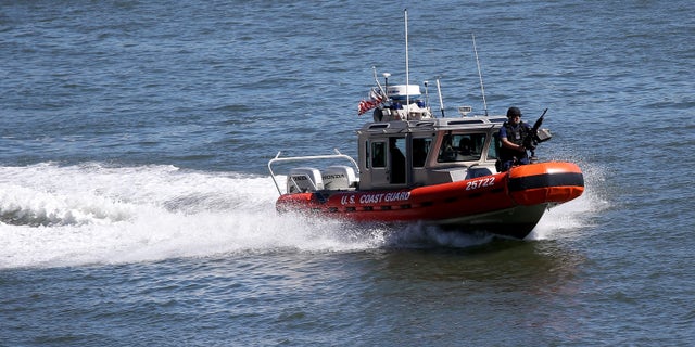 NEW YORK, NY - SEPTEMBER 23: A U.S. Coast Guard boat patrols the East River near the United Nations building ahead of the 68th session of the General Assembly on September 23, 2013 in New York City. With an influx of foreign dignitaries visiting heavy security and multiple road closures in the city is expected for this week's 68th session of the General Assembly of the United Nations. (Photo by John Moore/Getty Images)