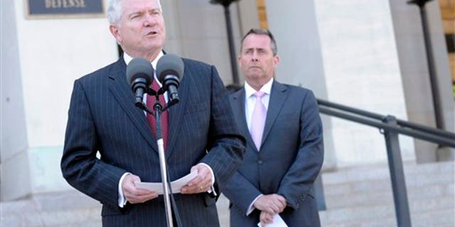 April 26: Defense Secretary Robert Gates, accompanied by British Defense Minister Liam Fox, speaks during joint statement at the Pentagon. (AP)