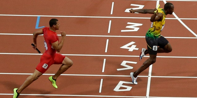 Aug. 11, 2012: Jamaica's Usain Bolt crosses the finish line ahead of United States' Ryan Bailey to win the men's 4x100 relay at the London Olympics.