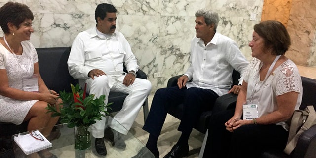 U.S. Secretary of State John Kerry meets with Venezuela president Nicolas Maduro in Cartagena, Colombia Monday, Sept. 26, 2016. (AP Photo/Vivian Salama)
