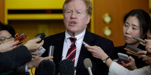 FILE - In this April 7, 2014, file photo, U.S. special envoy for North Korean human rights issues Robert King answers reporters' questions at the Foreign Ministry in Seoul, South Korea. (AP Photo/Lee Jin-man, File)