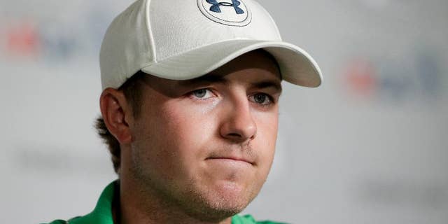 Jordan Spieth talks to the media during a news conference for U.S. Open golf tournament in Pinehurst, N.C., Monday, June 9, 2014. (AP Photo/Chris Carlson)