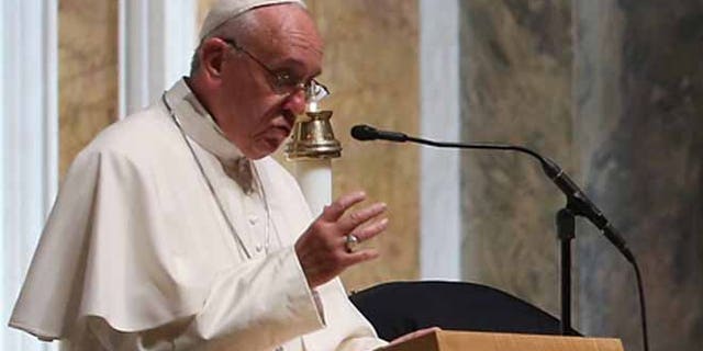 Pope Francis speaks to bishops during the midday prayer service at the Cathedral of St. Matthew in Washington D.C.
