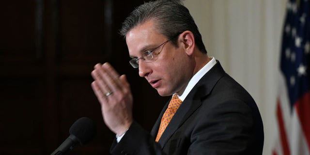 FILE - In this Dec. 16, 2015, file photo, Puerto Rico Gov. Alejandro Javier Garcia Padilla speaks at a luncheon at the National Press Club in Washington. Garcia said on Sunday, May 1, 2016, that negotiators for the U.S. territoryâs government have failed to reach a last-minute deal to avoid a third default and that he has issued an executive order to withhold payment. (AP Photo/Sait Serkan Gurbuz, File)