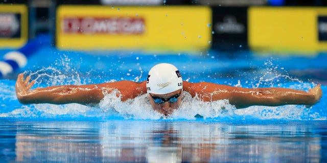 Ryan Lochte swims in the men's 200-meter individual medley preliminaries at the U.S. Olympic swimming trials, Thursday, June 30, 2016, in Omaha, Neb. (AP Photo/Orlin Wagner)