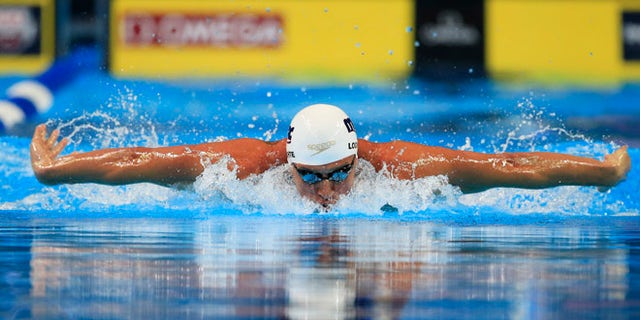 Ryan Lochte swims in the men's 200-meter individual medley preliminaries at the U.S. Olympic swimming trials, Thursday, June 30, 2016, in Omaha, Neb. (AP Photo/Orlin Wagner)