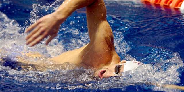 July 12: 2012: U.S. Olympic swim team member Michael Phelps practices at the University of Tennessee's Allan Jones Aquatic Center in Knoxville, Tenn.