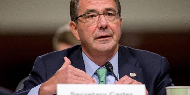 FILE - In this July 29, 2015, file photo, Defense Secretary Ash Carter testifies on Capitol Hill in Washington. The murky aftermath of the attack on Syrian rebels last week by al-Qaida-linked militants has raised questions about how the small, ragtag group of U.S.-trained forces was sent into battle and whether the military needs to make adjustments to the program. (AP Photo/Andrew Harnik)