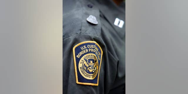 An agent wears the new U.S. Customs and Border Protection patch on his sleeve April 24, 2004 in Aguadilla, Puerto Rico.