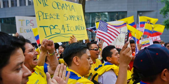 A coalition of community leaders and immigrant advocates demonstrate outside U.S. immigration offices, calling on federal authorities to designate Ecuador for Temporary Protected Status (TPS) for its nationals in the aftermath of last April's 7.8 magnitude earthquake, Wednesday June 1, 2016, in New York. (AP Photo/Bebeto Matthews)