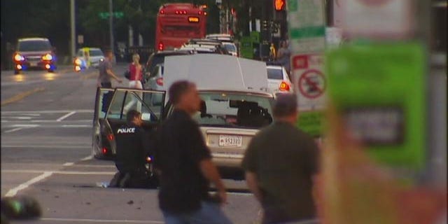 May 24, 2015: Police check a suspicious vehicle near the West Front of the U.S. Capitol Building in Washington D.C. (MyFoxDC.com)