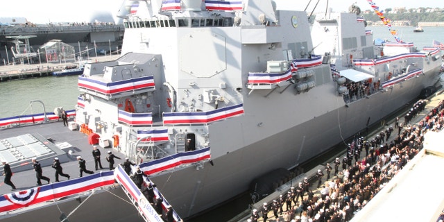 Oct. 6, 2012: The crew of the USS Michael Murphy mans the ship and brings her to life during the commissioning ceremony for the Navy's newest guided-missile destroyer.