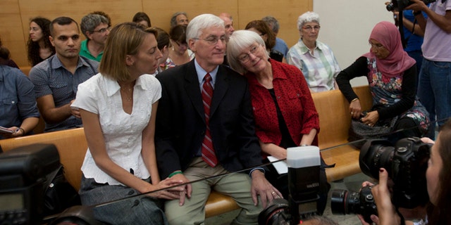 Aug. 28, 2012: Cindy, center right, and Craig Corrie, center, the parents of Rachel Corrie, a pro-Palestinian activist who was killed by an Israeli bulldozer in Gaza in 2003, sit together with their daughter Sarah, center left, in the court room just before the district court's ruling in Haifa, Israel.
