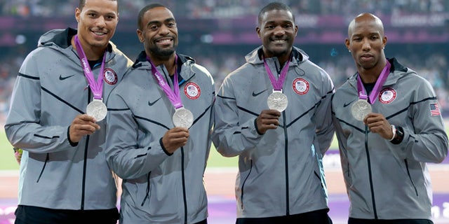 Aug. 11, 2012: Silver medalists (R-L) Trell Kimmons, Justin Gatlin, Tyson Gay and Ryan Bailey of the U.S. pose after receiving their medals for the men's 4x100m relay during the London 2012 Olympic Games at the Olympic Stadium.