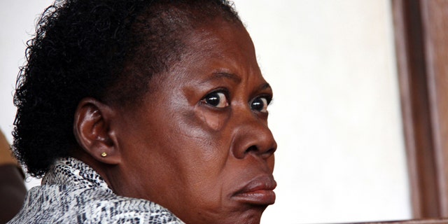 March 20, 2014: A Ugandan nurse, Rosemary Namubiru, sits in court in the capital Kampala, Uganda.