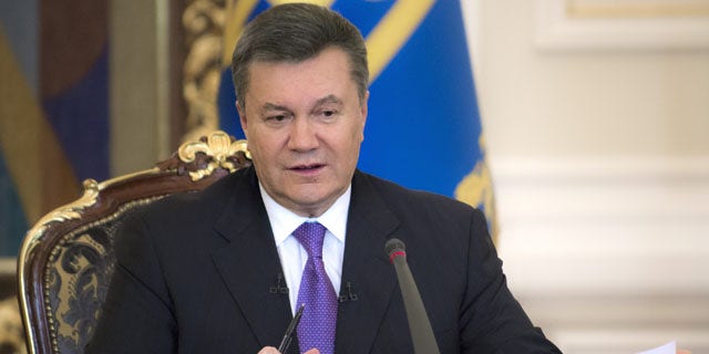 December 19, 2013: Ukrainian President Viktor Yanukovych speaks during a press conference in Kiev. (AP Photo/Mykhailo Markiv, Pool)