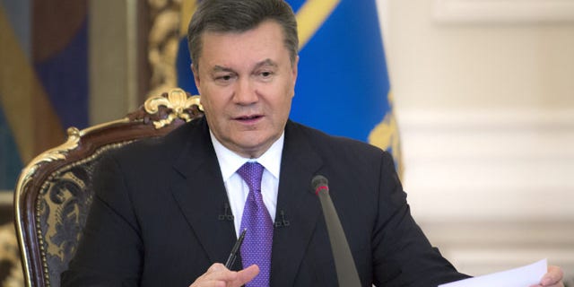 December 19, 2013: Ukrainian President Viktor Yanukovych speaks during a press conference in Kiev. (AP Photo/Mykhailo Markiv, Pool)