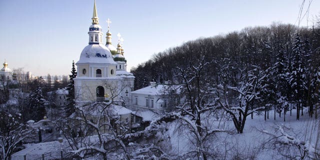January 30, 2012: An Orthodox Christian cathedral in winter landscape in Kiev, Ukraine. Ukraine's Emergency Situations Ministry said 18 people died of hypothermia and nearly 500 people sought medical help for frostbites and hypothermia in just three days last week.